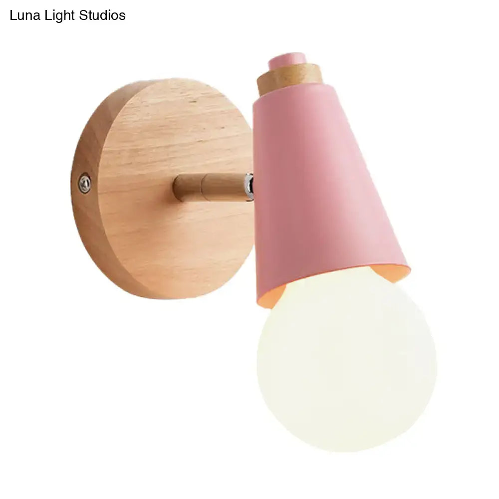 Pink cone wall sconce by Decorbites with wooden backplate and arm, bulb visible on Tampa Home & Garden Store