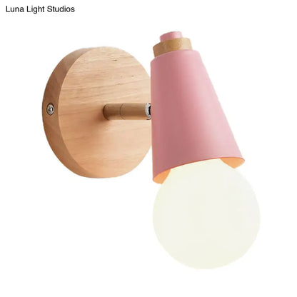 Pink cone wall sconce by Decorbites with wooden backplate and arm, bulb visible on Tampa Home & Garden Store
