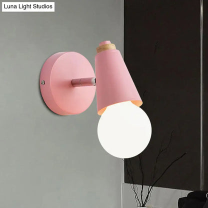 Pink cone wall sconce by Decorbites with pink circular wall mount and exposed bulb on Tampa Home & Garden Store
