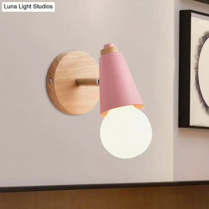 Pink Cone Wall Sconce with round wooden backplate and glowing bulb Decorbites on Tampa Home & Garden Store