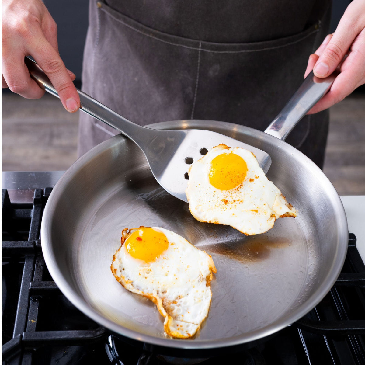5-Ply Stainless Steel Frying Pan Alva Cookware with sunny-side eggs in pan on Tampa Home & Garden Store