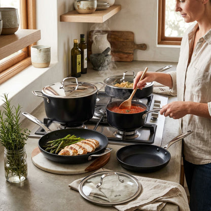 Alva Ceramic Nonstick Cookware Set 12-Piece on stovetop with steaming pots and lids on Tampa Home & Garden Store