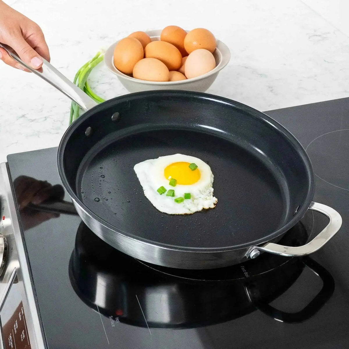 5-Ply Nonstick Stainless Frying Pan by Alva Cookware with sunny-side egg in pan on Tampa Home & Garden Store