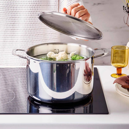 Alva Cookware 7-Qt stainless stock pot with lid; broccoli inside on Tampa Home & Garden Store