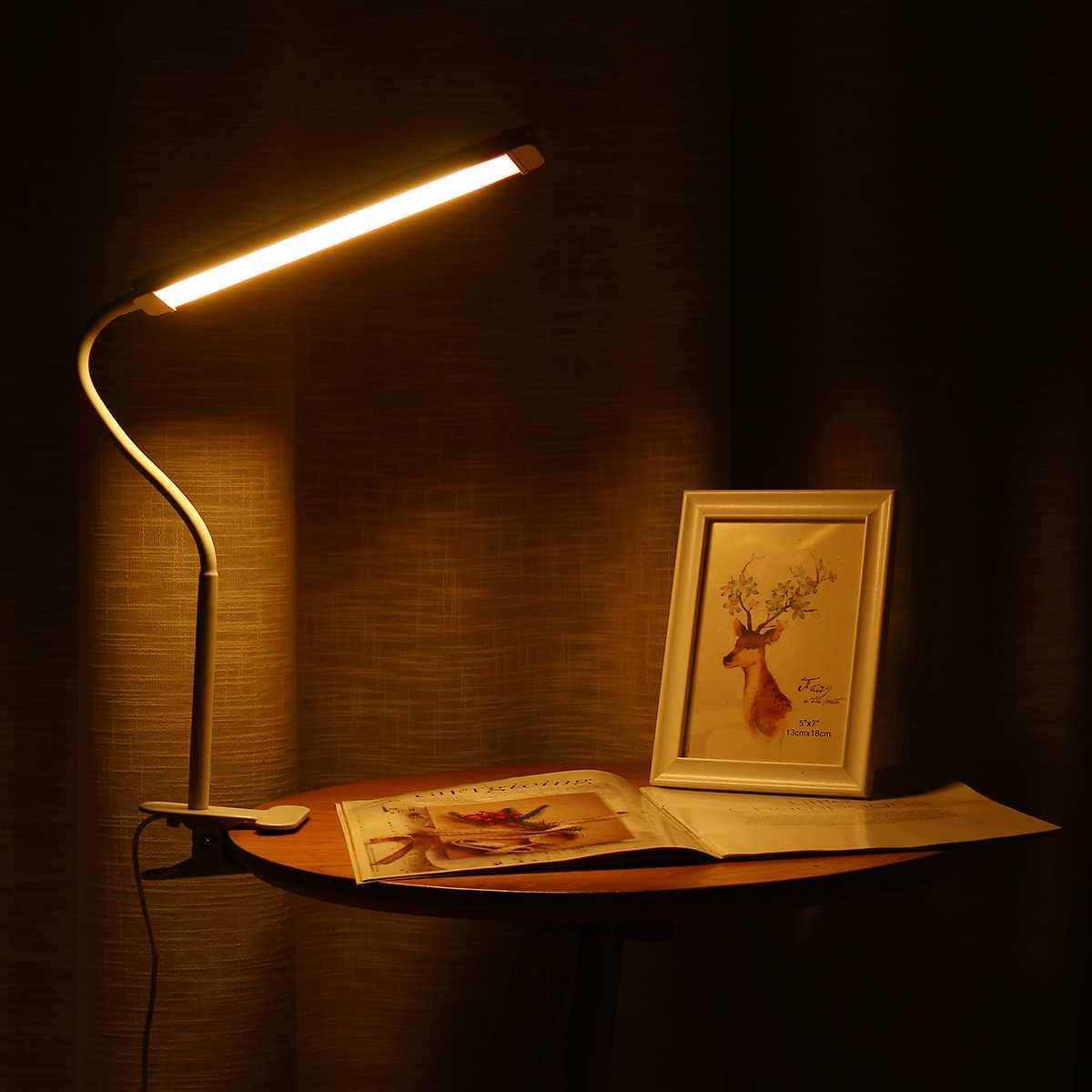 Stevvex desk lamp with flexible LED bar in warm white light beside a framed deer art on Tampa Home & Garden Store