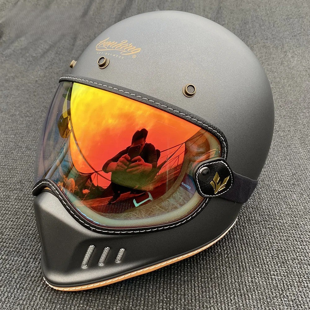 AeroShield Motorcycle Goggles with orange mirrored lens and black strap on Tampa Home & Garden Store