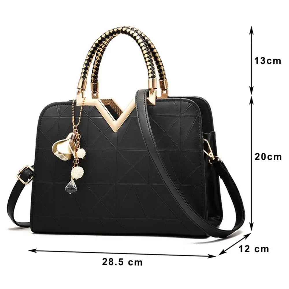 Stevvex ST92987KLM black leather satchel bag with gold-tone top handles and crossbody strap on Tampa Home & Garden Store