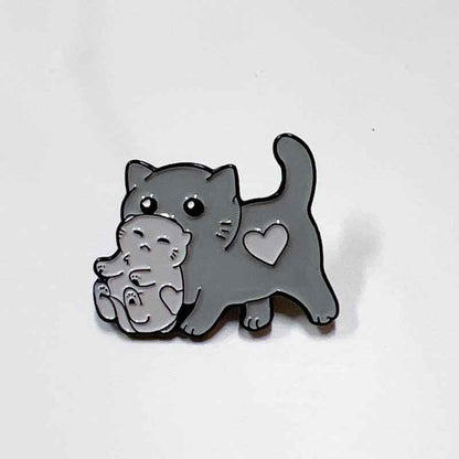 Mama Cat carrying kitten enamel pin, gray cat brooch by Shaketea for cat lovers on Tampa Home & Garden Store