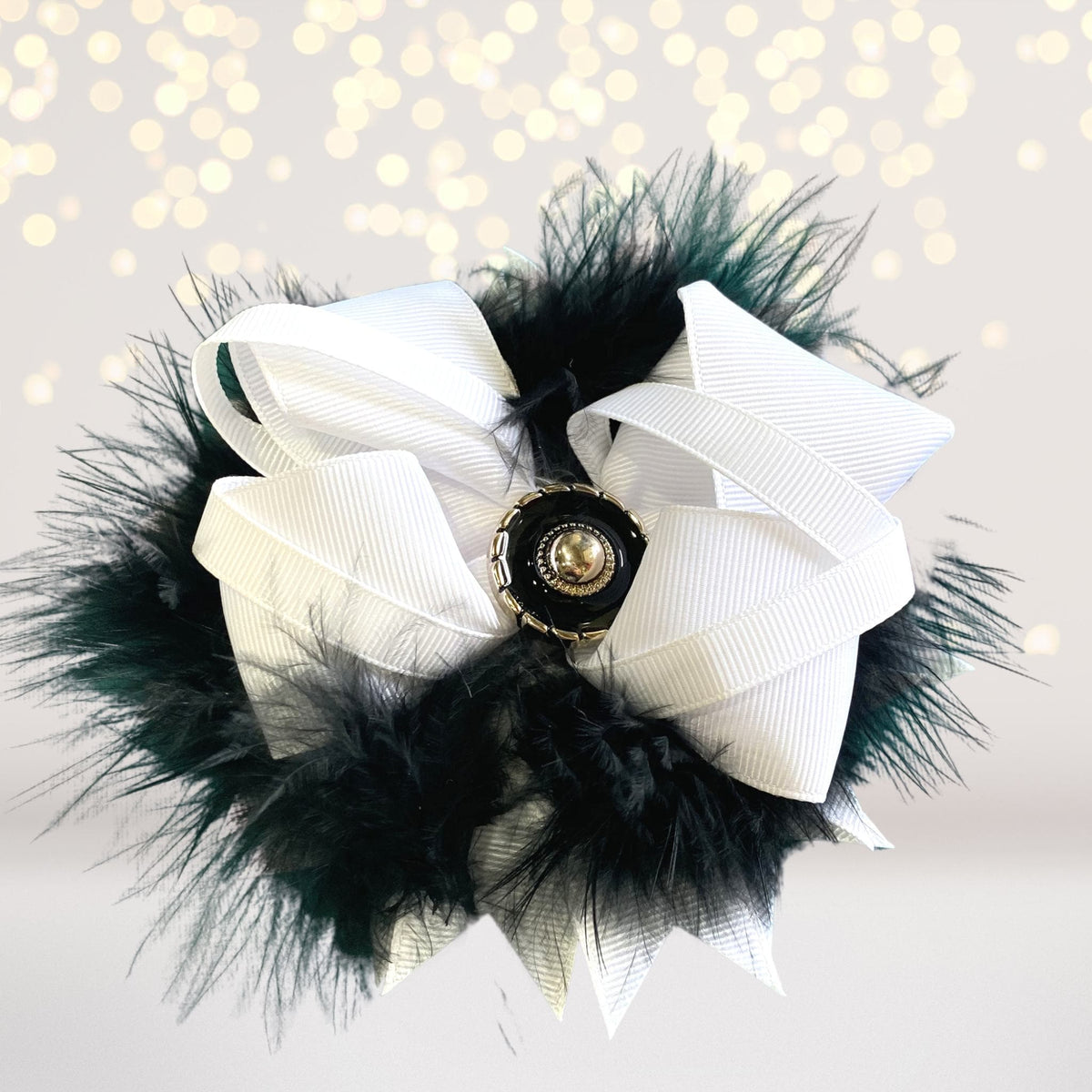 Vegas or Casino themed sleepover kit white bow with black feathers gold centerpiece on Tampa Home & Garden Store
