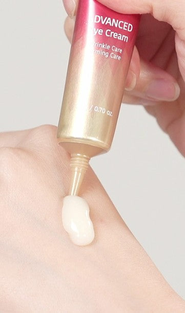 MAXCLINIC Advanced Eye Cream 20g tube gradient red-to-gold packaging squeezing cream onto skin on Tampa Home & Garden Store