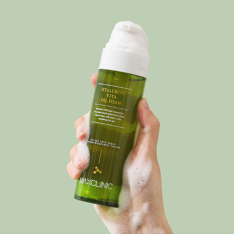 MAXCLINIC Hyaluron Vita Oil Foam cleansing oil bottle in green with white pump held on Tampa Home & Garden Store