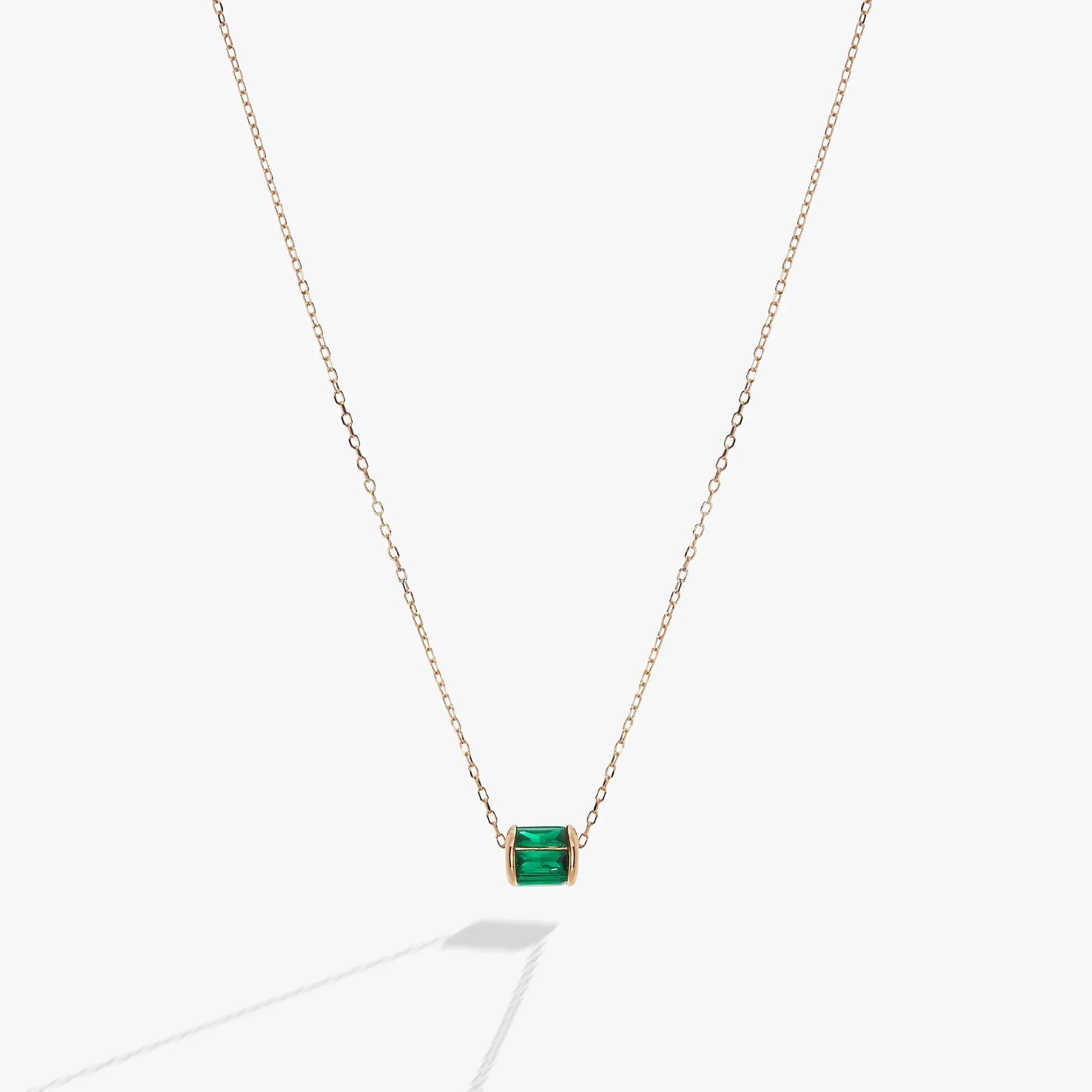 May Birthstone Pendant Necklace with emerald-green gemstone in gold setting on chain on Tampa Home & Garden Store