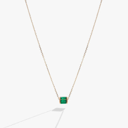 May Birthstone Pendant Necklace with emerald-green gemstone in gold setting on chain on Tampa Home & Garden Store