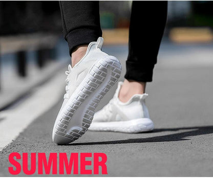 Stevvex white athletic running shoes pair with breathable mesh upper and cushioned sole on Tampa Home & Garden Store