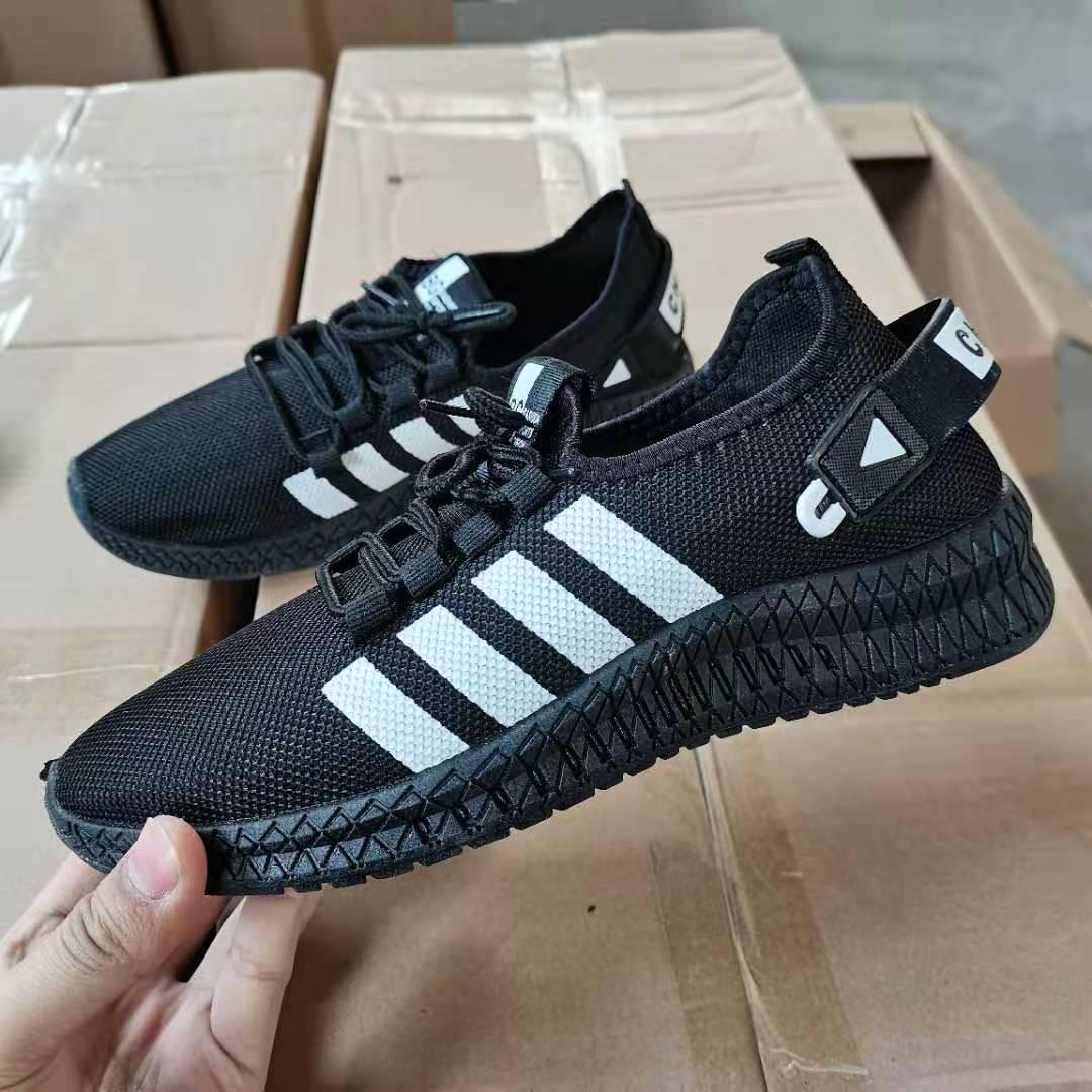 Stevvex black mesh sneakers with white stripes, breathable lace-up running trainers on Tampa Home & Garden Store