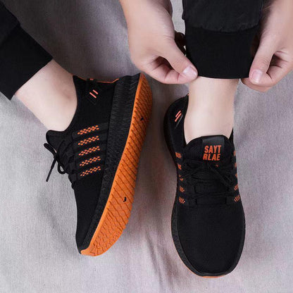 Stevvex men mesh sneakers, black upper, orange outsole, lace-up running trainers on Tampa Home & Garden Store