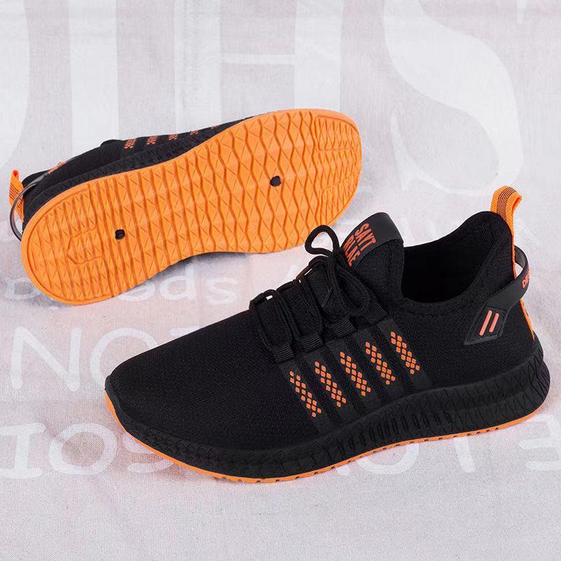 Stevvex men's black breathable mesh sneakers with orange outsole, lace-up running style on Tampa Home & Garden Store