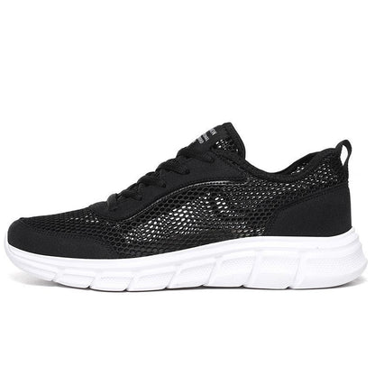 Stevvex men's black mesh sneakers with breathable upper and white cushioned sole on Tampa Home & Garden Store