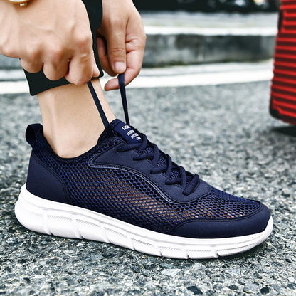 Men's navy blue mesh sneaker by Stevvex with white sole, lace-up running shoe on Tampa Home & Garden Store