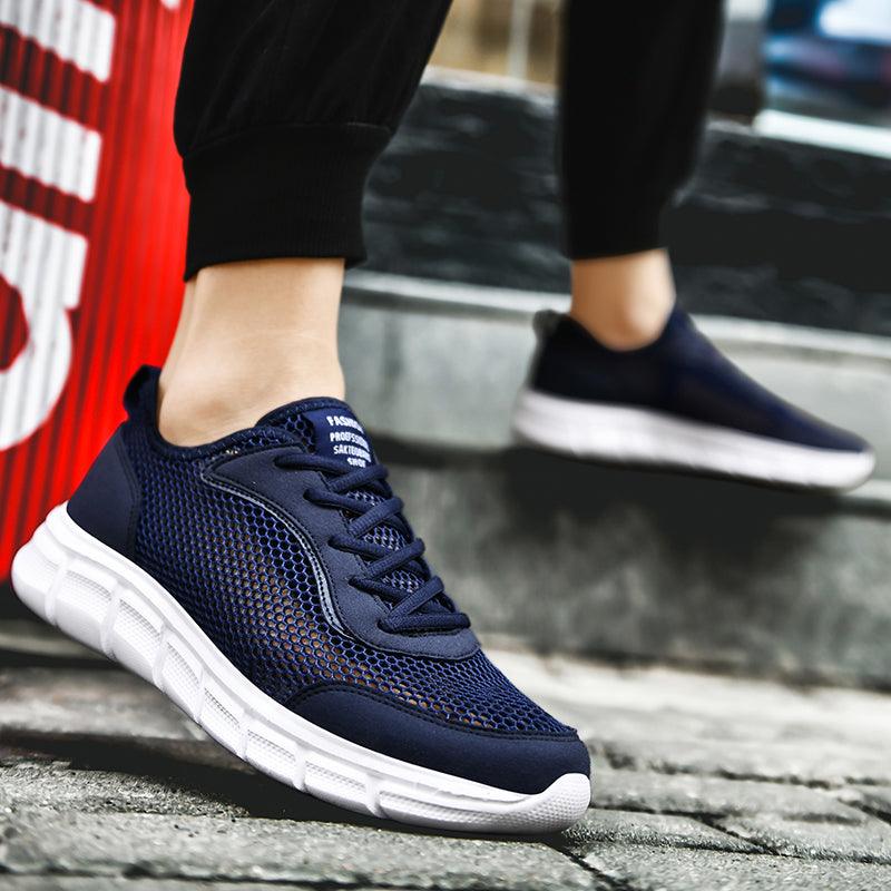 Men's navy blue mesh sneakers pair with white sole by Stevvex, breathable casual athletic shoes on Tampa Home & Garden Store