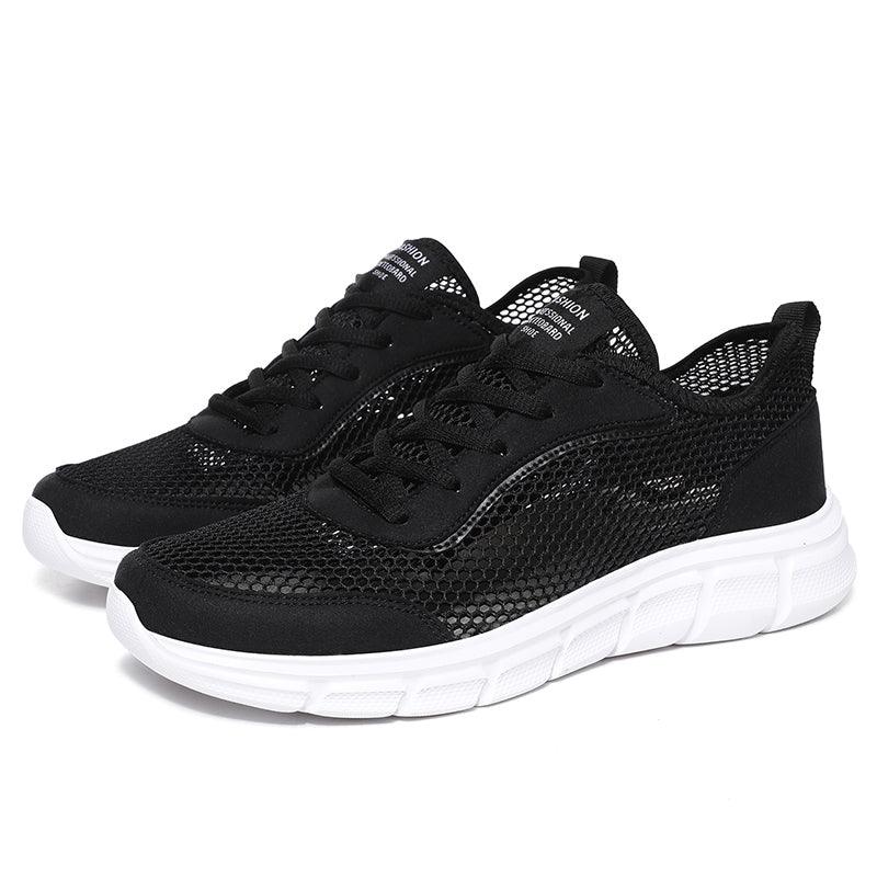 Stevvex men's black mesh sneakers pair with breathable upper and white sole on Tampa Home & Garden Store