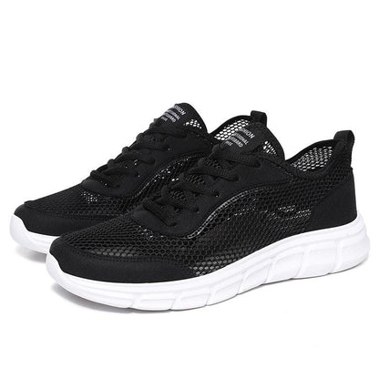 Stevvex men's black mesh sneakers pair with breathable upper and white sole on Tampa Home & Garden Store