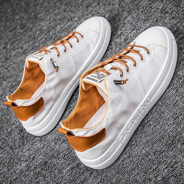 Stevvex men's casual canvas sneakers, white low-top lace-up with tan interior on Tampa Home & Garden Store