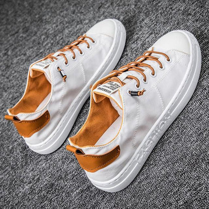 Stevvex men's casual canvas sneakers, white low-top lace-up with tan interior on Tampa Home & Garden Store