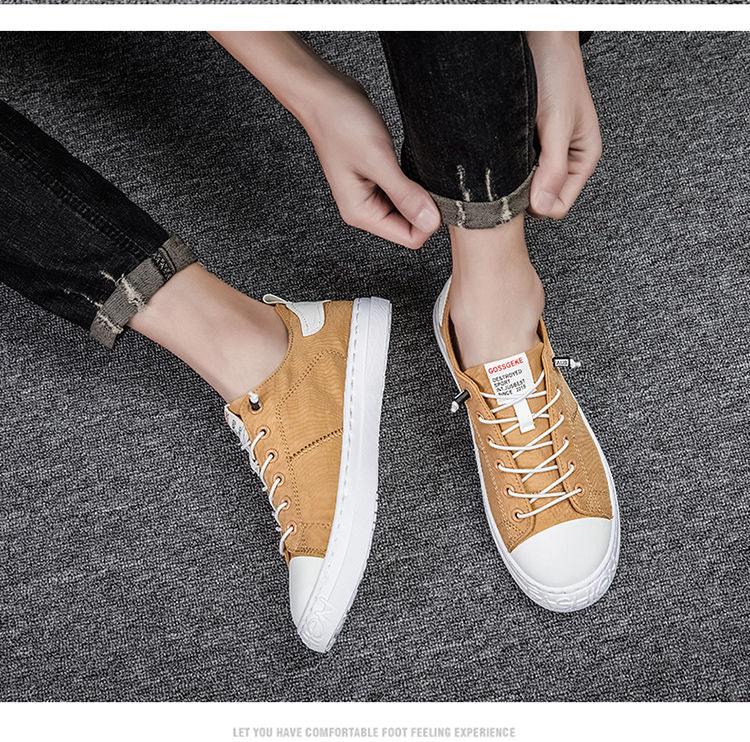 Stevvex tan canvas sneakers lace-up pair with white toe caps and soles on gray carpet on Tampa Home & Garden Store