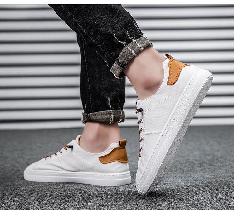 Stevvex white canvas sneakers with tan heel patch, lace-up casual walking shoes on Tampa Home & Garden Store