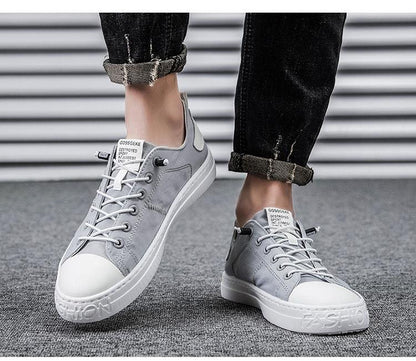 Stevvex grey canvas sneakers pair with white toe caps and rubber sole, lace-up casual shoes on Tampa Home & Garden Store