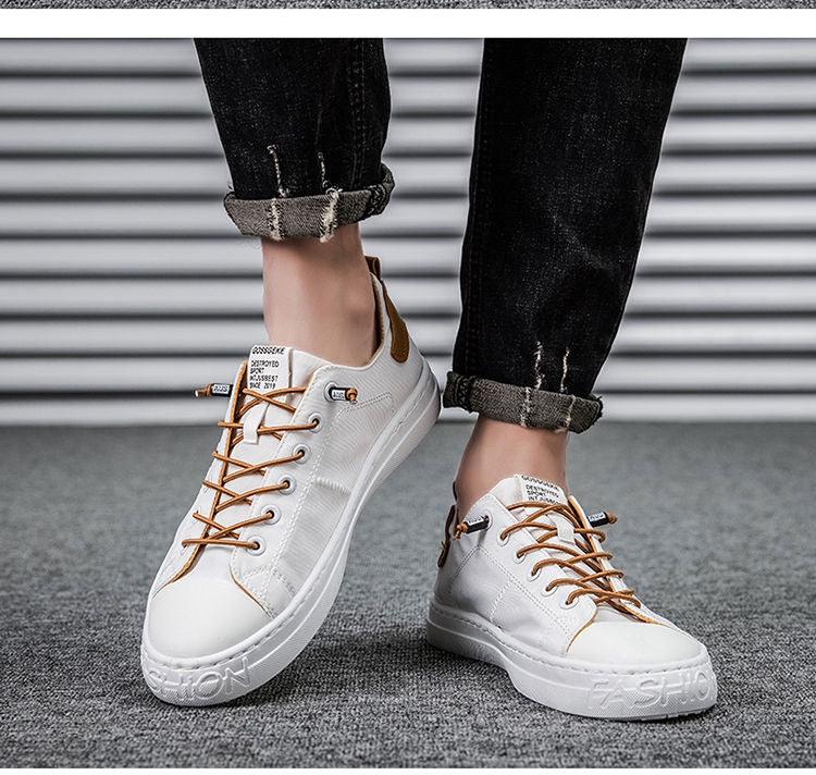 Stevvex men's white canvas sneakers with brown laces, low-top casual walking shoes pair on Tampa Home & Garden Store