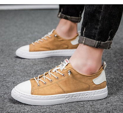 Mens tan canvas sneakers low-top with white toe cap and lace-up design, Stevvex on Tampa Home & Garden Store