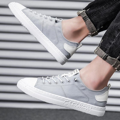 Men casual canvas sneakers Stevvex gray lace-up low-top pair with white sole on Tampa Home & Garden Store