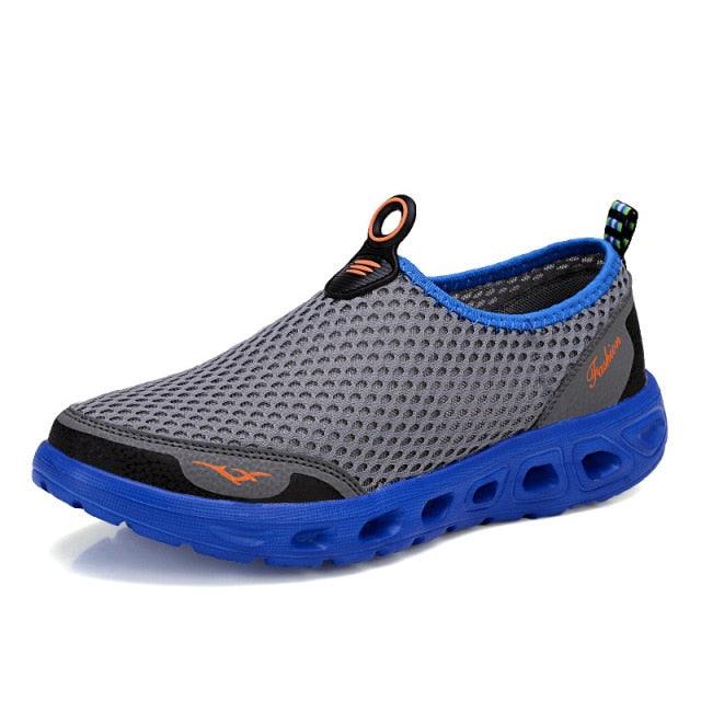 Steevex men's mesh sneakers gray breathable upper with blue sole slip-on walking shoes on Tampa Home & Garden Store