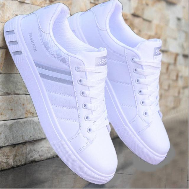 Stevvex white sneakers for men, casual flat breathable vulcanized sports shoes pair on Tampa Home & Garden Store