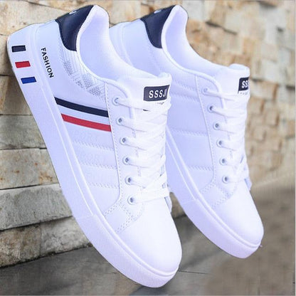 Stevvex men's white sneakers, casual breathable sport shoes with blue red stripe accents on Tampa Home & Garden Store