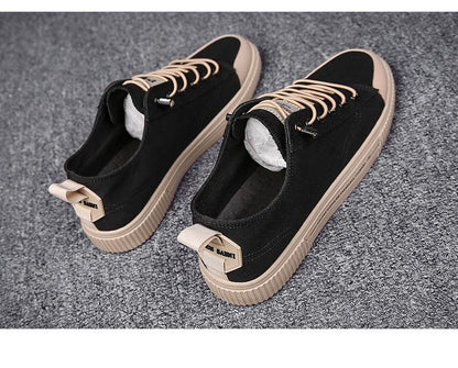 Stevvex black canvas sneakers with beige rubber sole and laces, casual walking shoes on Tampa Home & Garden Store