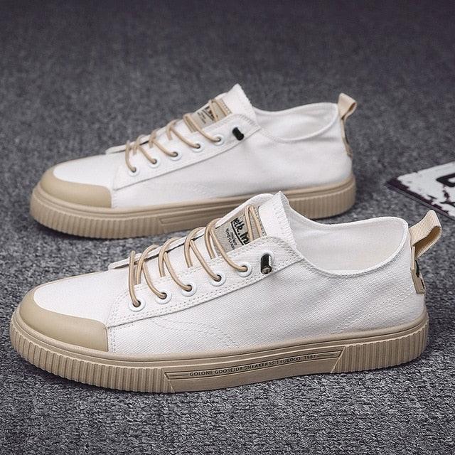 Stevvex men's canvas sneakers white with beige toe cap and beige sole pair on ground on Tampa Home & Garden Store
