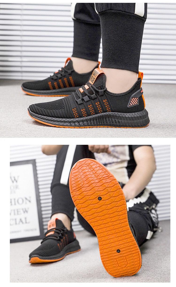 Stevvex men's sneakers black mesh orange sole lightweight gym running trainers pair from side on Tampa Home & Garden Store