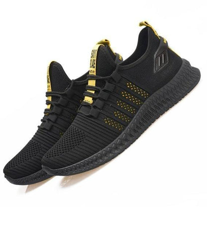 Stevvex men's sneakers pair with breathable black mesh, orange sole, lightweight trainers on Tampa Home & Garden Store