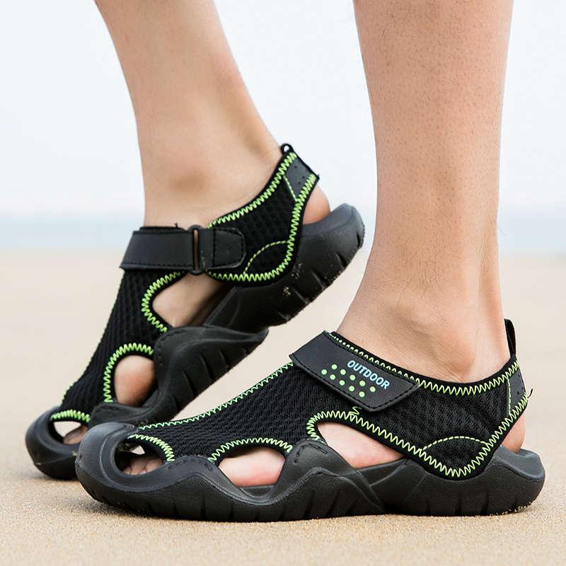 Men's outdoor sandals Stevvex pair with black mesh upper and lime green stitching on Tampa Home & Garden Store