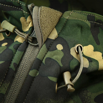 Stevvex men's green camouflage windbreaker close-up of drawcord, metal grommets, and zipper on Tampa Home & Garden Store