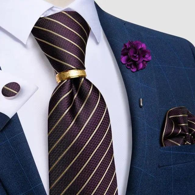 Men's red silk necktie with gold diagonal stripes and gold tie bar on white shirt navy suit on Tampa Home & Garden Store