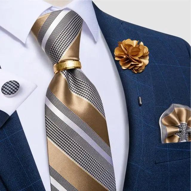 Stevvex men's luxury striped gold silk necktie with boutonniere on blue suit on Tampa Home & Garden Store