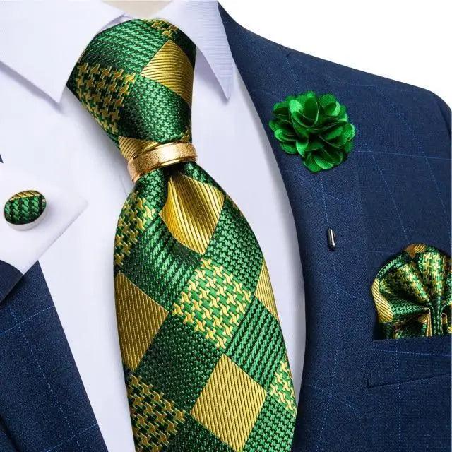 Stevvex men's necktie and cufflinks set, green gold plaid tie on navy suit with lapel flower on Tampa Home & Garden Store