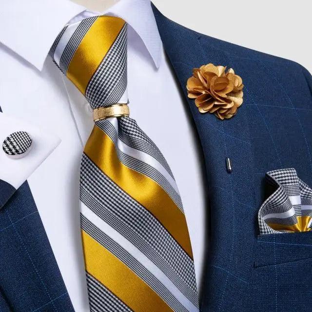 Men silk striped necktie in gold and gray with white shirt and blue suit on Tampa Home & Garden Store