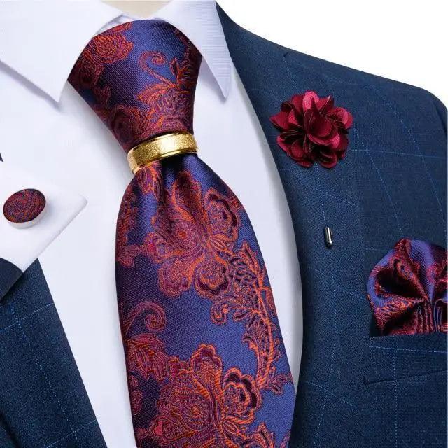 Men silk necktie by Stevvex with purple base and red floral pattern on Tampa Home & Garden Store
