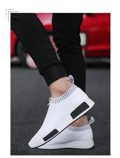 Stevvex men's white knit running shoes with sock-style collar, breathable mesh, black side block accents on sole on Tampa Home & Garden Store