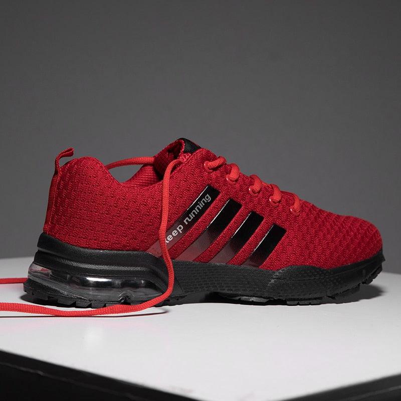 Men's Stevvex red breathable mesh running sneakers with air cushion and black sole on Tampa Home & Garden Store